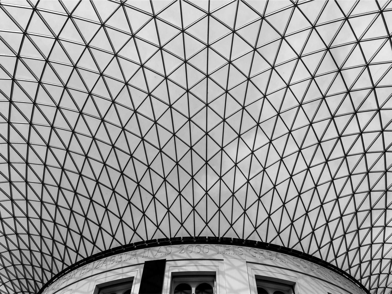 Curving glass and steel lattice roof